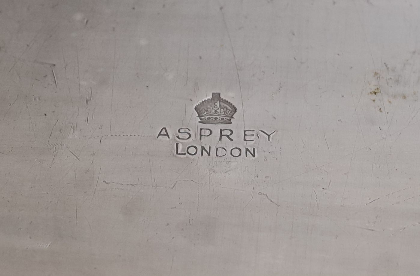An Asprey two handled hot plate and a double gourd shaped soda stream, 50 cms high.